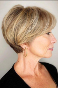 Side view of a  Hairstyles for Women Over 60 with fine hair styled in a short layered bob haircut adding volume and texture